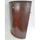 Georgian mahogany quarter cylinder corner cupboard