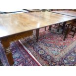 Early 20thC oak extending dining table