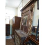 Heavy oak church altar with carved gilt front panel and top with highlighted picture of Madonna and