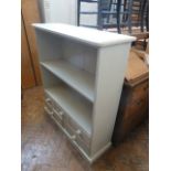 Painted pine combination bookshelf with drawers