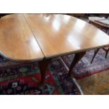 Victorian mahogany drop leaf dining table on pad feet