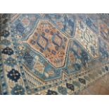 Blue ground Persian rug (72" x 36")