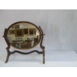 Early 20thC walnut oval swing toilet mirror
