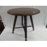 Early 20thC circular revolving top pub table