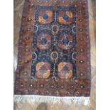 Red and blue Afghan rug (54" x 36")