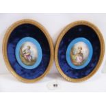 Pair continental porcelain painted plaques mounted in velvet lined gilt frames