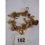 9ct Gold charm bracelets with assortment of charms attached - mostly stamped 9ct