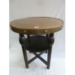 Circular brass top pub type table