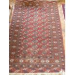 Red ground Afghan rug (52" x 78")