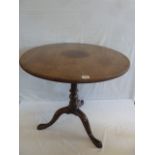 George III circular mahogany tripod bird cage tilt top tea table