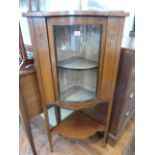 Edwardian inlaid mahogany quarter cylinder glazed corner display cabinet with bottom shelf