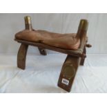 Brass mounted leather seat camel stool