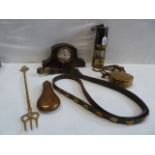 Brass miners lamp, oak case mantel clock, copper and inlaid brass powder flasks, strap,