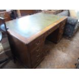 Early 20thC large oak leather inset office desk