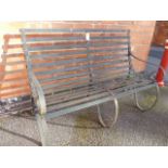 Wrought iron slatted garden bench
