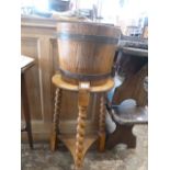 Coopered oak barrel jardiniere on twist leg tripod stand