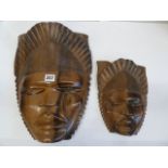Carved African hardwood face mask plaques (2)