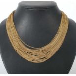 Collier1960/70er Jahre, Alfred Rave, München, Gelbgold 750, 28 feine Kettenstränge im