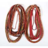Konvolut ScheibenkettenWestafrika, 20. Jh., ca. 17 Scheibenketten, vorranig in Rot und Gelb, versch.