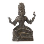 Sitzende GottheitIndien/Südostasien, 19./20. Jh., Bronze, 4-armige Gottheit, eine kleine Antilope