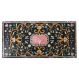 Pietra Dura Tischplatte20. Jh., sog. Florentiner Mosaik aus formgeschnittenen verschiedenfarbigen