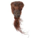 Helmmaske der LeleDR Kongo, Holz geschwärzt, Bast, H: ca. 60 cm.- - -25.00 % buyer's premium on