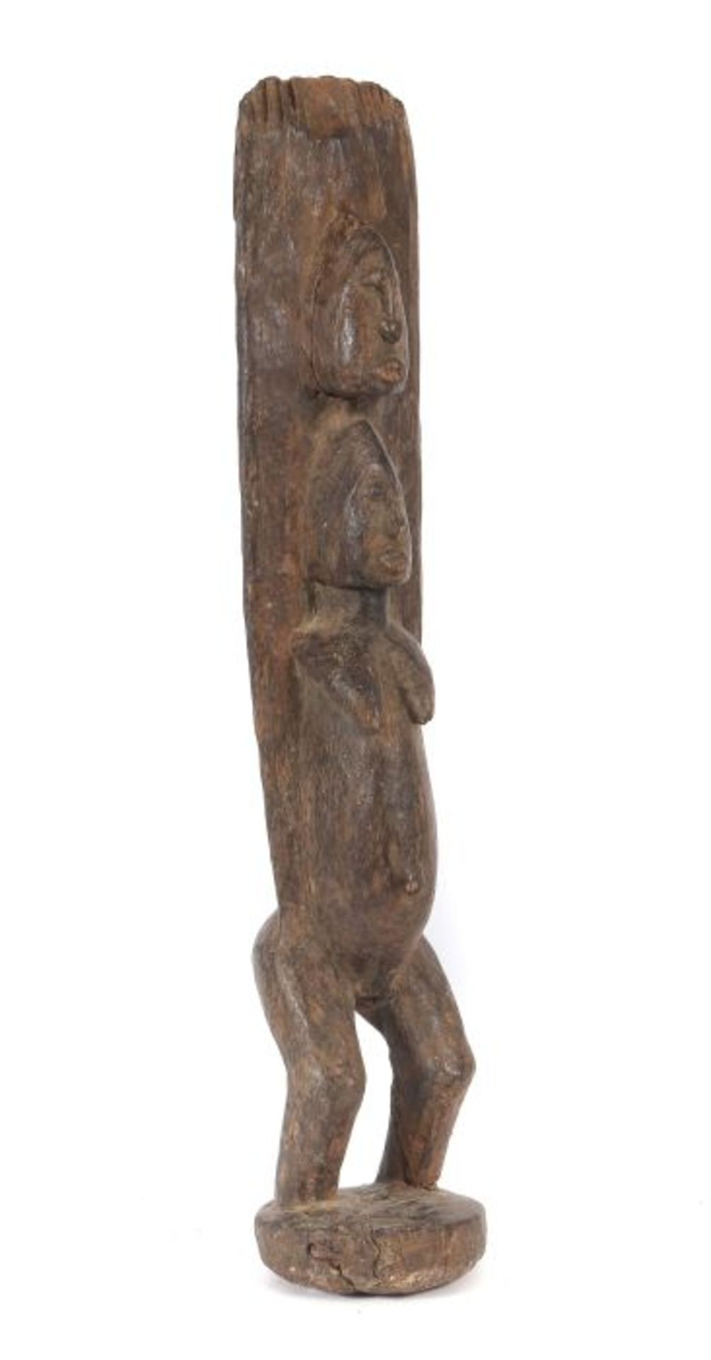 Standfigur der DogonMali, Holz, mit zwei übereinanderstehenden Köpfen H: 52 cm.- - -25.00 % buyer'