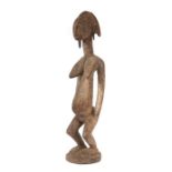 Stehende Frauenfigur der SenufoMali, Holz, mit vier Haarschöpfen, H: 60 cm.- - -25.00 % buyer's
