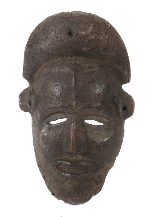 Maske der IboNigeria, Holz, geschwärzt, mit geschnitzter Kopfbedeckung, H: 25 cm.- - -25.00 %