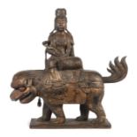 Große Figur der Guanyin mit ReittierChina, 19./20. Jh., Holz, Reste einer Fassung, die Guanyin auf