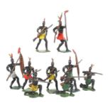 9 afrikanische KriegerZinnfiguren, eventulle Heyde Nbg., 9 bewaffnete Afrikaner mit Federschmuck,