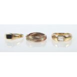 3 Damenringe1970er Jahre, Gelbgold 333/375, 1x besetzt mit kleinem Onyx, 1x an Trilogie-