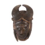 Kpelie Maske der SenufoElfenbeinküste, Holz, mit gekalkten Details, H: 25 cm.- - -25.00 % buyer's