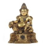 Jambhala Kuberasinotibetisch, 19. Jh., Bronze/vergoldet, part. Reste einer partiellen Farbfassung,