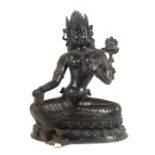 Grüne TaraTibet/Nepal, um 1900, Bronze, vollplastische Darstellung der Tara, in lalitasana sitzend,