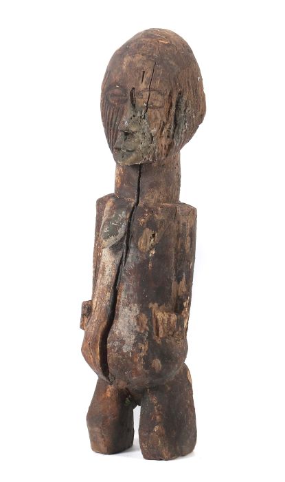 Fragment einer weiblichen StandfigurAfrika, Holz, mit Gesichtsnarbenschmuck, H: 28 cm.- - -25.00 %