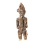 Männliche Standfigurwohl Westafrika, Holz, mit Spitzhut und Kinnbart, H: ca. 60 cm.- - -25.00 %