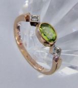 DAMENRING585/000 Rotgold mit Peridot und 2 Diamanten. Gr. 58, Brutto ca. 2,4g