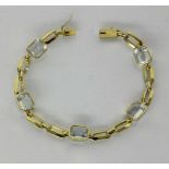 ARMBAND585/000 Gelbgold mit Aquamarinen. L.20cm, Brutto ca. 16,9g