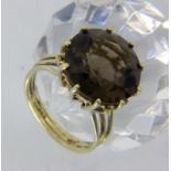 DAMENRING585/000 Gelbgold mit Rauchtops. Gr. 54, Brutto ca. 6,5gA LADIES' RING 585/000 yellow gold