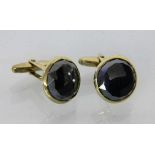 PAAR MANSCHETTENKNPÖPFE585/000 Gelbgold mit Hämatit. Brutto ca. 13,3gA PAIR OF CUFFLINKS 585/000