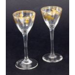 ZWEI JUGENDSTIL LIKÖRKELCHEum 1900 Farbloses Glas mit Golddekor. H.12cmTWO ART NOUVEAU GOBLETS circa