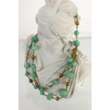 JADEKETTE333/000 Gelbgold. L.68cm, Brutto 46gA JADE NECKLACE 333/000 yellow gold. 68 cm long,