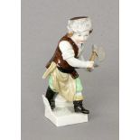 MONATSFIGUR "STERNZEICHEN WIDDER"KPM Berlin, 20.Jh. Polychrom staffierte Kinderfigur mit Pistole und