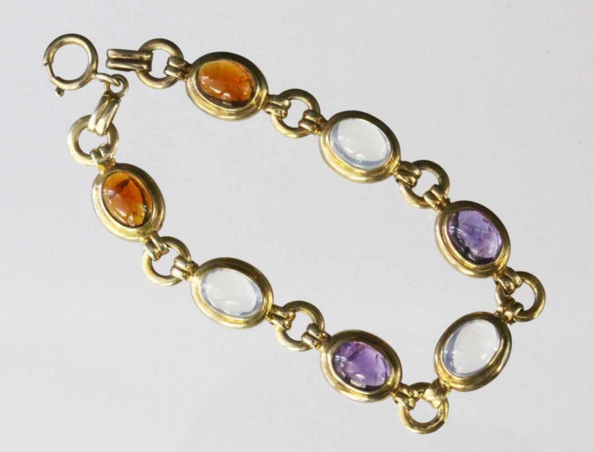 ARMBANDSilber vergoldet mit Citrin, Amethyst und Mondstein. L.19cmA BRACELET Gilt silver with