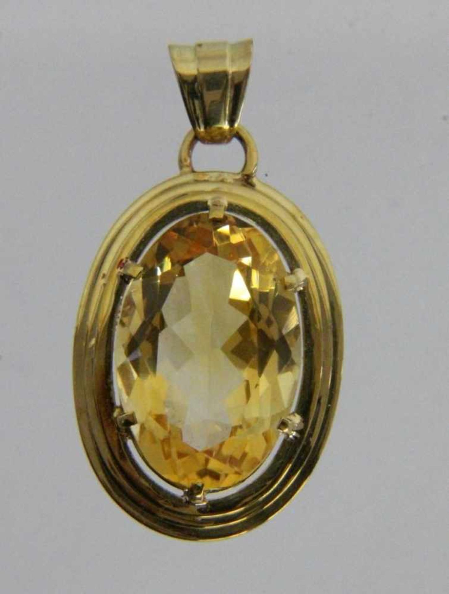 ANHÄNGER585/000 Gelbgold mit Citrin. L. 4cm, Brutto ca. 9,5gA PENDANT 585/000 yellow gold with