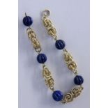 ARMBAND585/000 Gelbgold mit Lapislazuli. L.20,5cm, Brutto ca. 19,6gA BRACELET 585/000 yellow gold