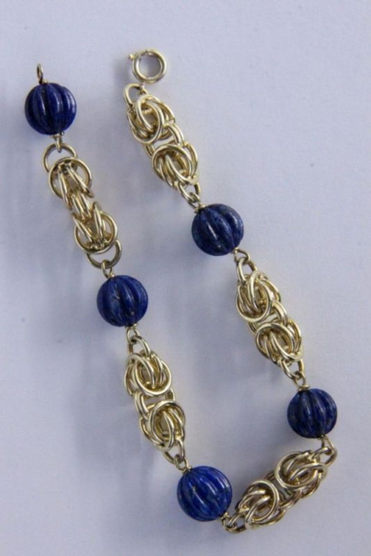 ARMBAND585/000 Gelbgold mit Lapislazuli. L.20,5cm, Brutto ca. 19,6gA BRACELET 585/000 yellow gold