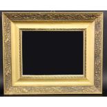 WANDSPIEGELmit vergoldetem Stuckrahmen. 28x33,5cmA WALL MIRROR with gilt stucco frame. 28 x 33.5 cm