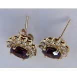 PAAR GRANATOHRSTECKER585/000 Gelbgold mit Diamanten. D.10mm, Brutto ca. 3gA PAIR OF GARNET STUD